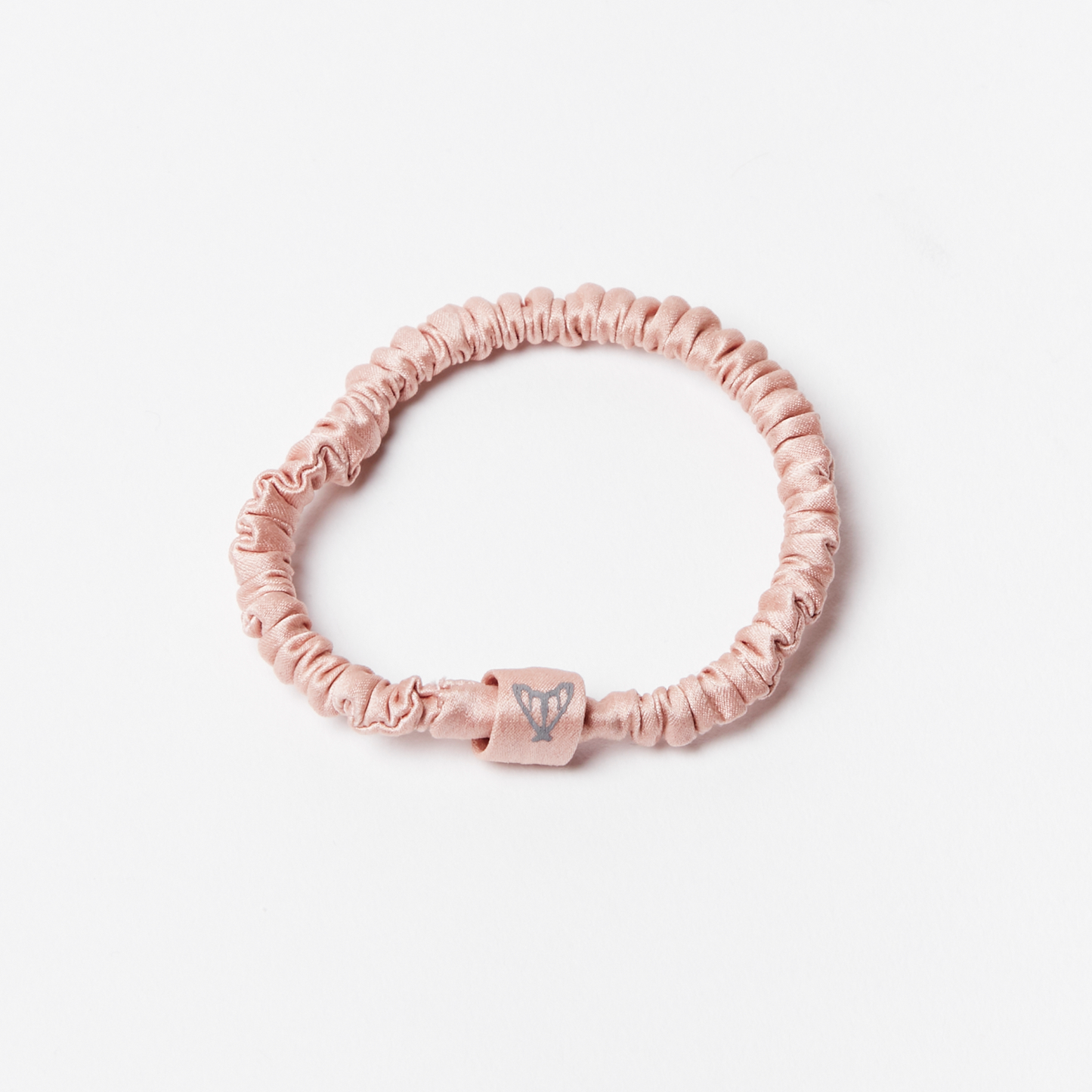 Pink silk scrunchie hair tie in glossy pink silk with ethical moth embroidery