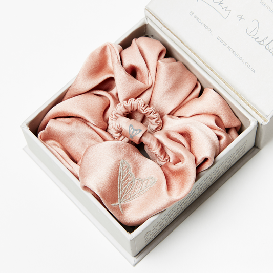 Pink silk scrunchie and pink silk hair tie, both in glossy pink ethical silk in gift box